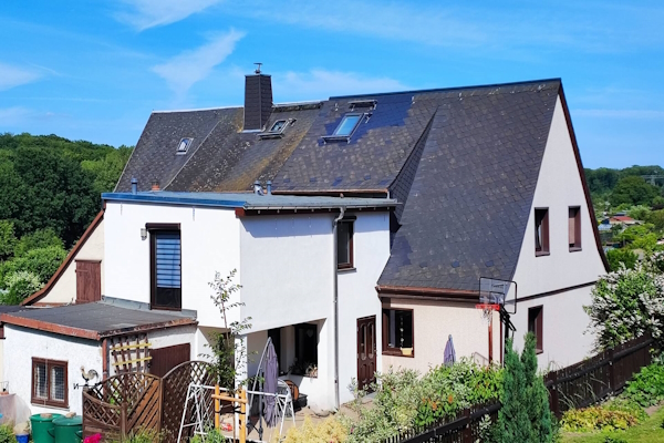 erfahrungsbericht-einfamilienhaus-hausansicht-rueckseite-s Elektroheizung im Altbau-Einfamilienhaus: Erfahrungsbericht